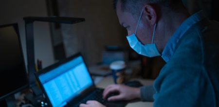 a man deal with cyber security during covid-19