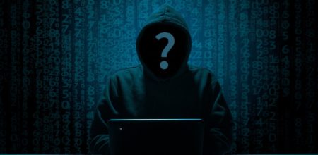 hacker is dealing with cyber risk